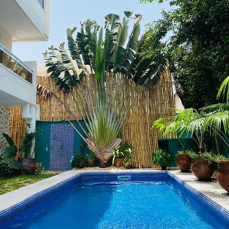 L'Oasis Guesthouse Cotonou Exteriör bild