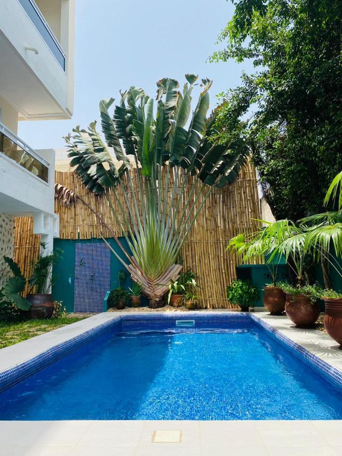 L'Oasis Guesthouse Cotonou Exteriör bild