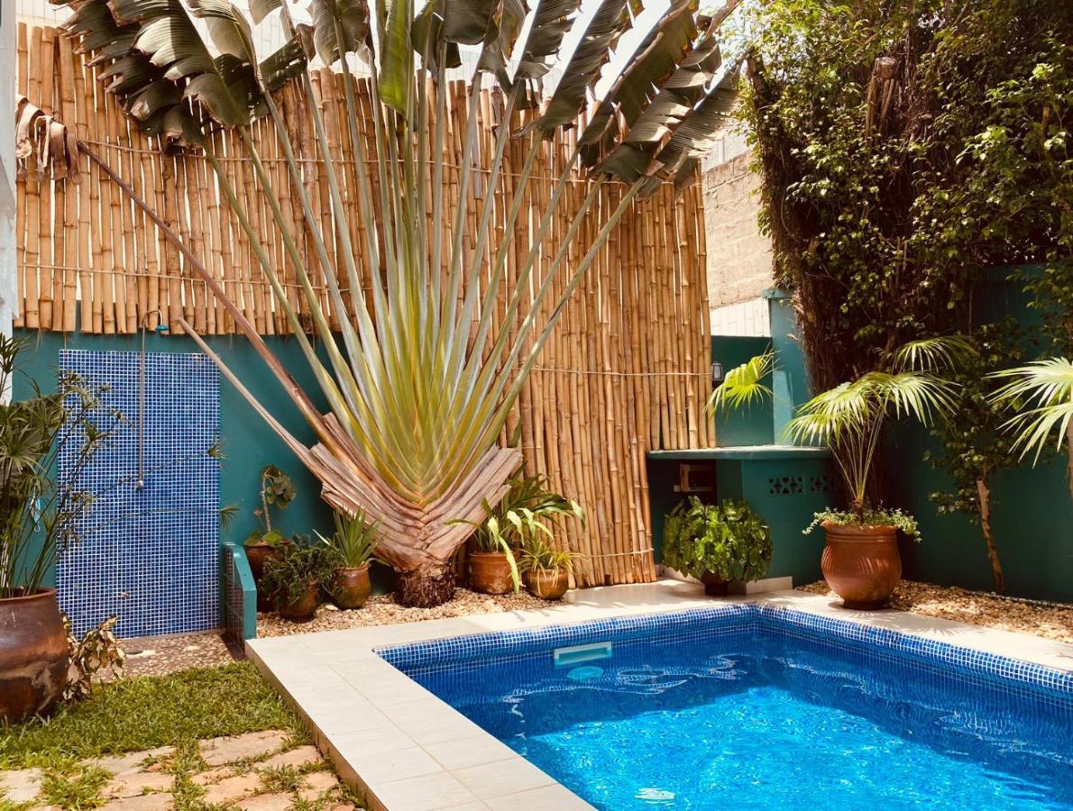 L'Oasis Guesthouse Cotonou Exteriör bild