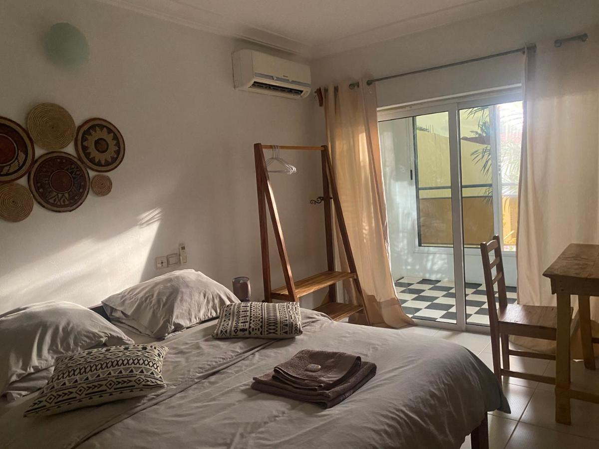 L'Oasis Guesthouse Cotonou Exteriör bild