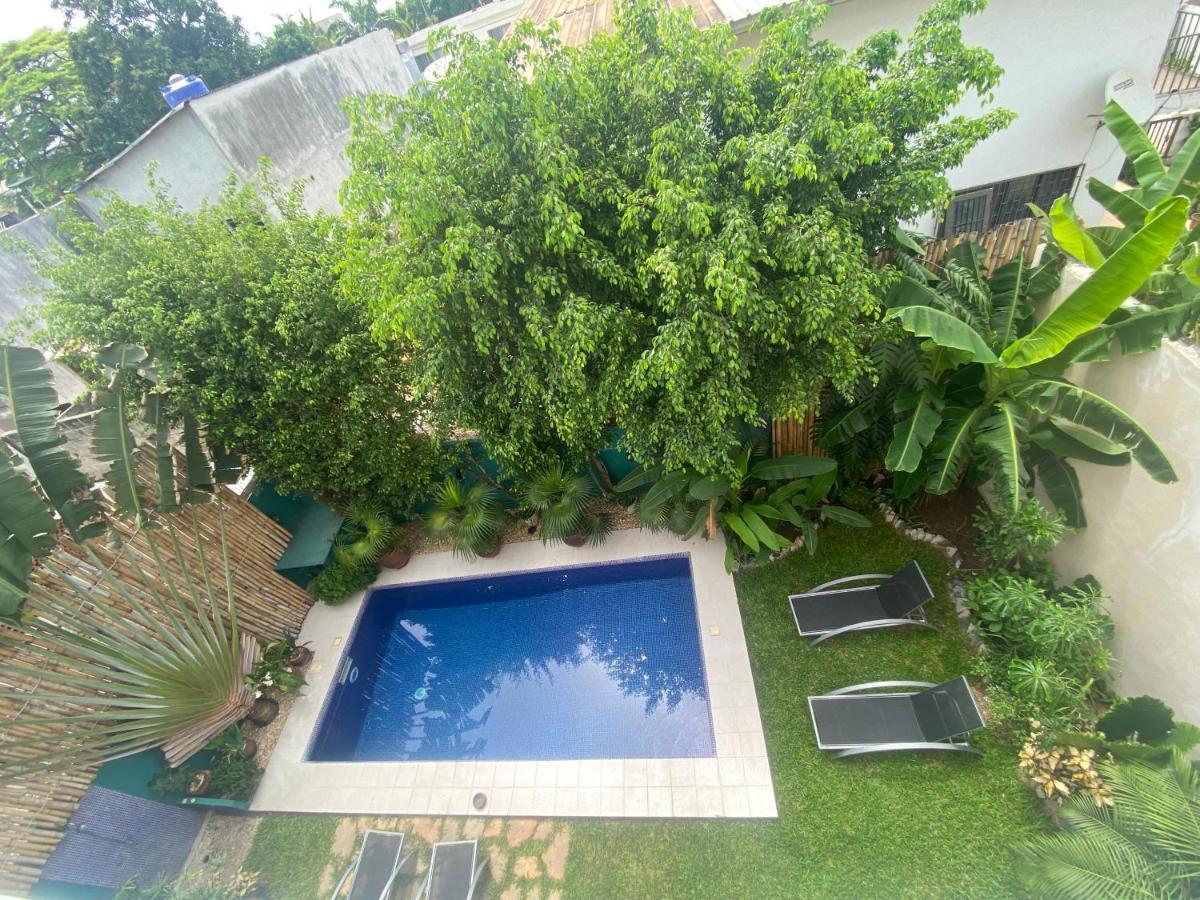 L'Oasis Guesthouse Cotonou Exteriör bild