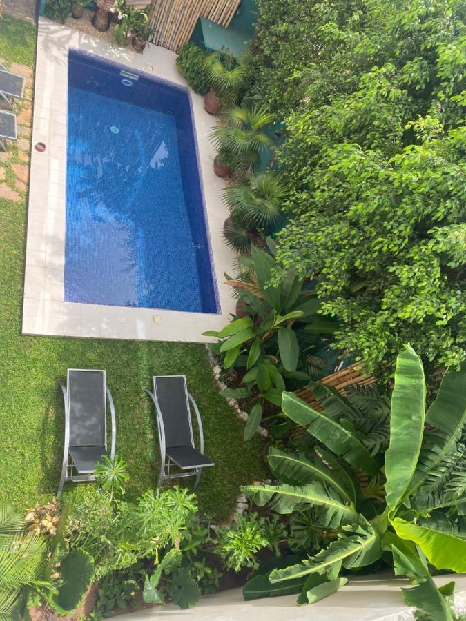L'Oasis Guesthouse Cotonou Exteriör bild