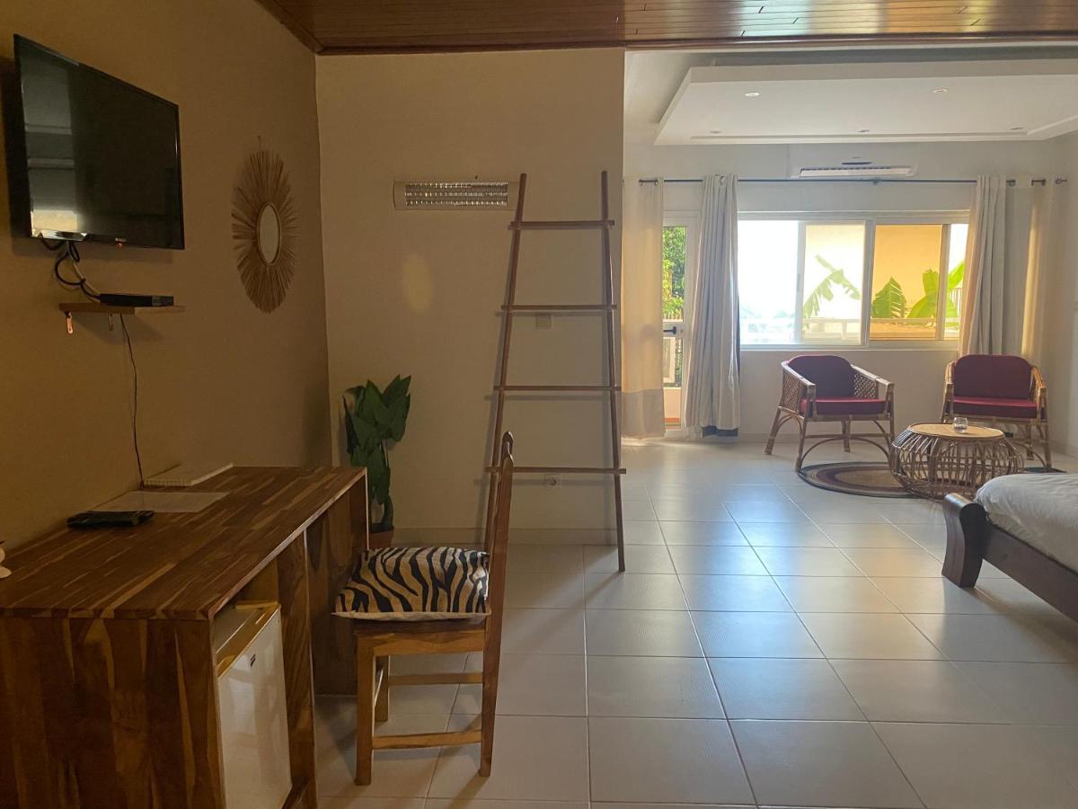 L'Oasis Guesthouse Cotonou Exteriör bild