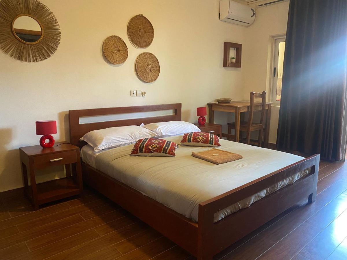 L'Oasis Guesthouse Cotonou Exteriör bild