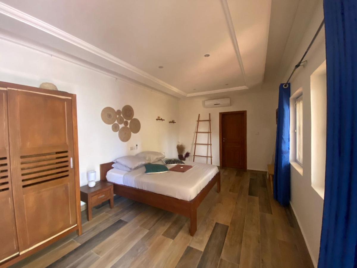 L'Oasis Guesthouse Cotonou Exteriör bild