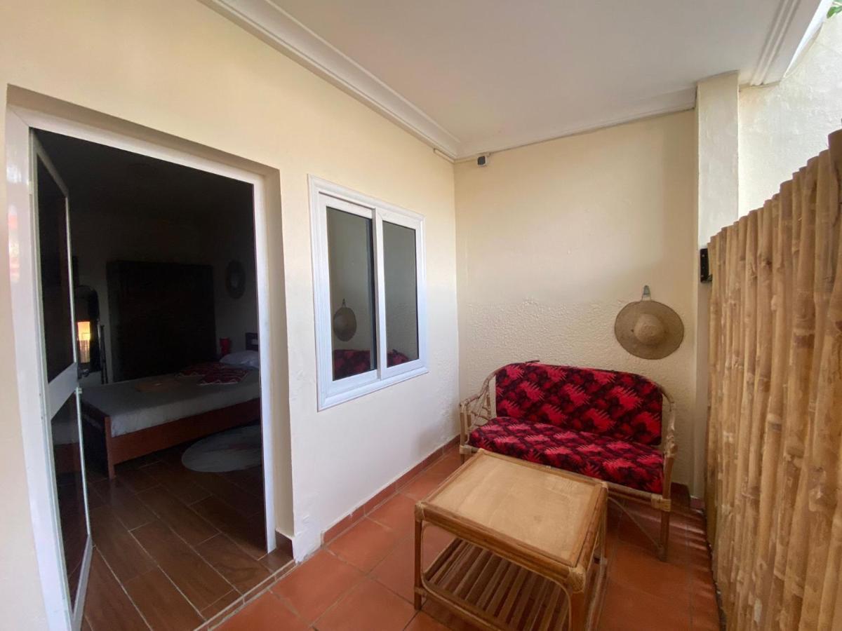 L'Oasis Guesthouse Cotonou Exteriör bild