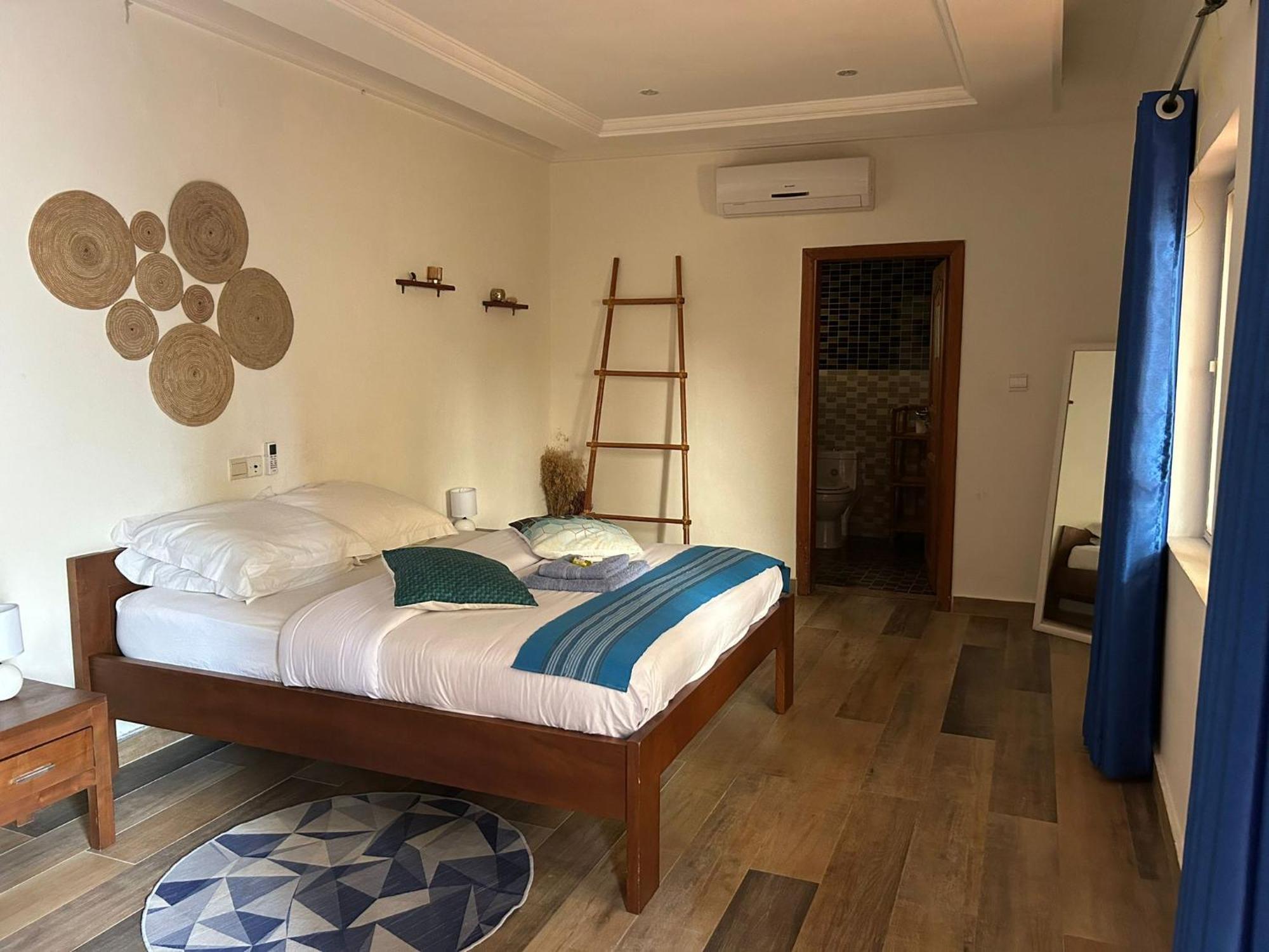 L'Oasis Guesthouse Cotonou Exteriör bild