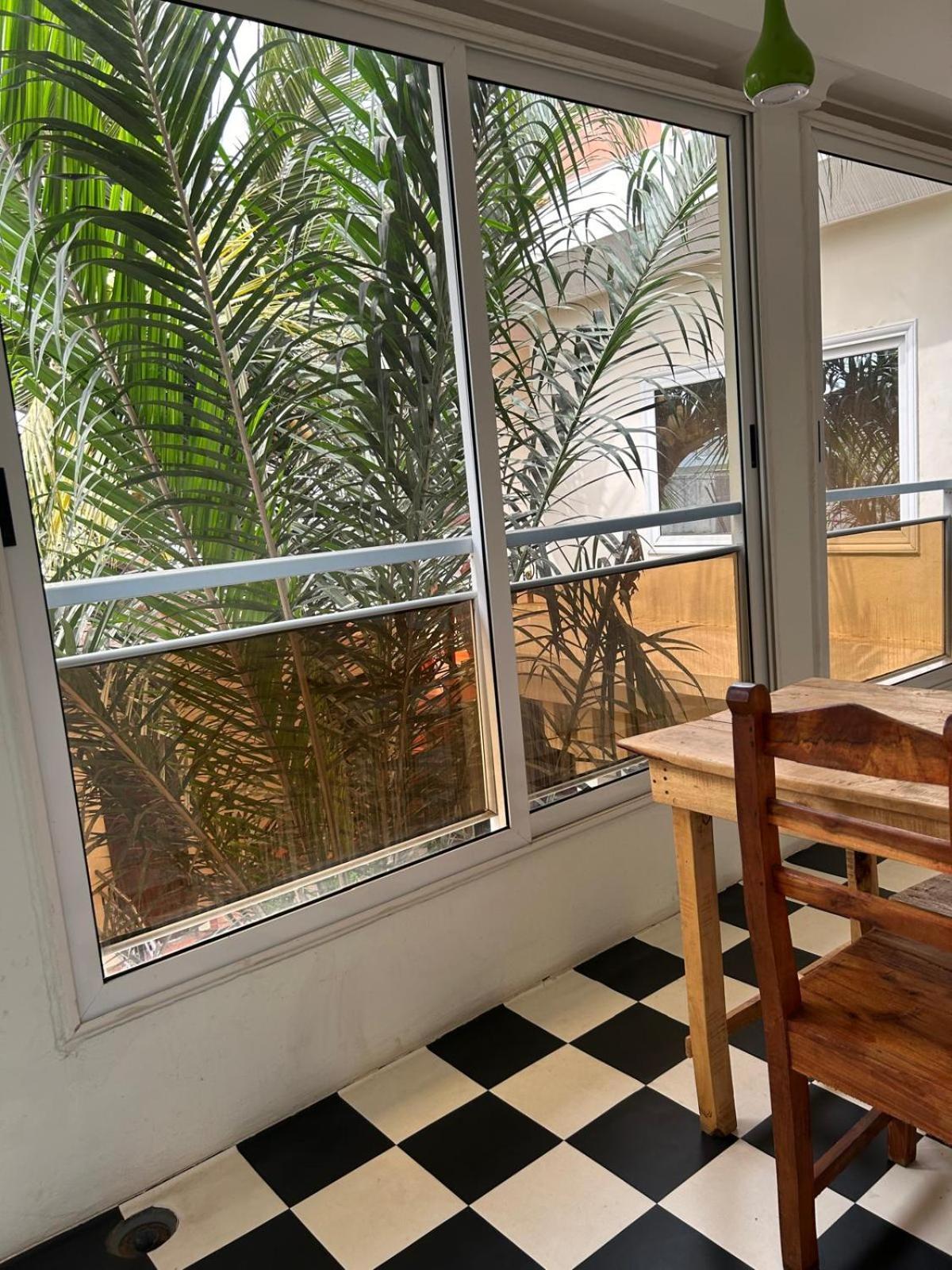 L'Oasis Guesthouse Cotonou Exteriör bild