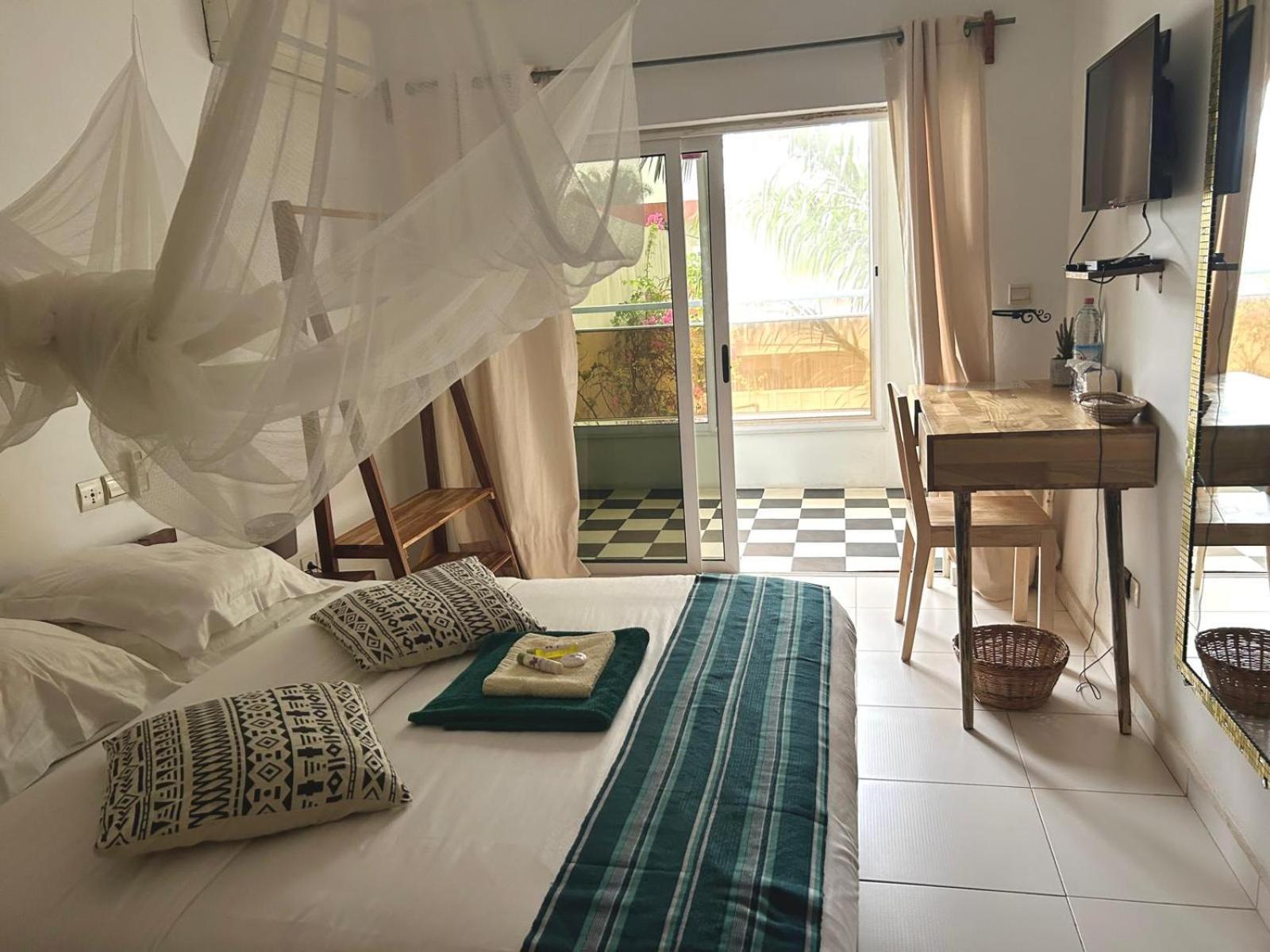 L'Oasis Guesthouse Cotonou Exteriör bild