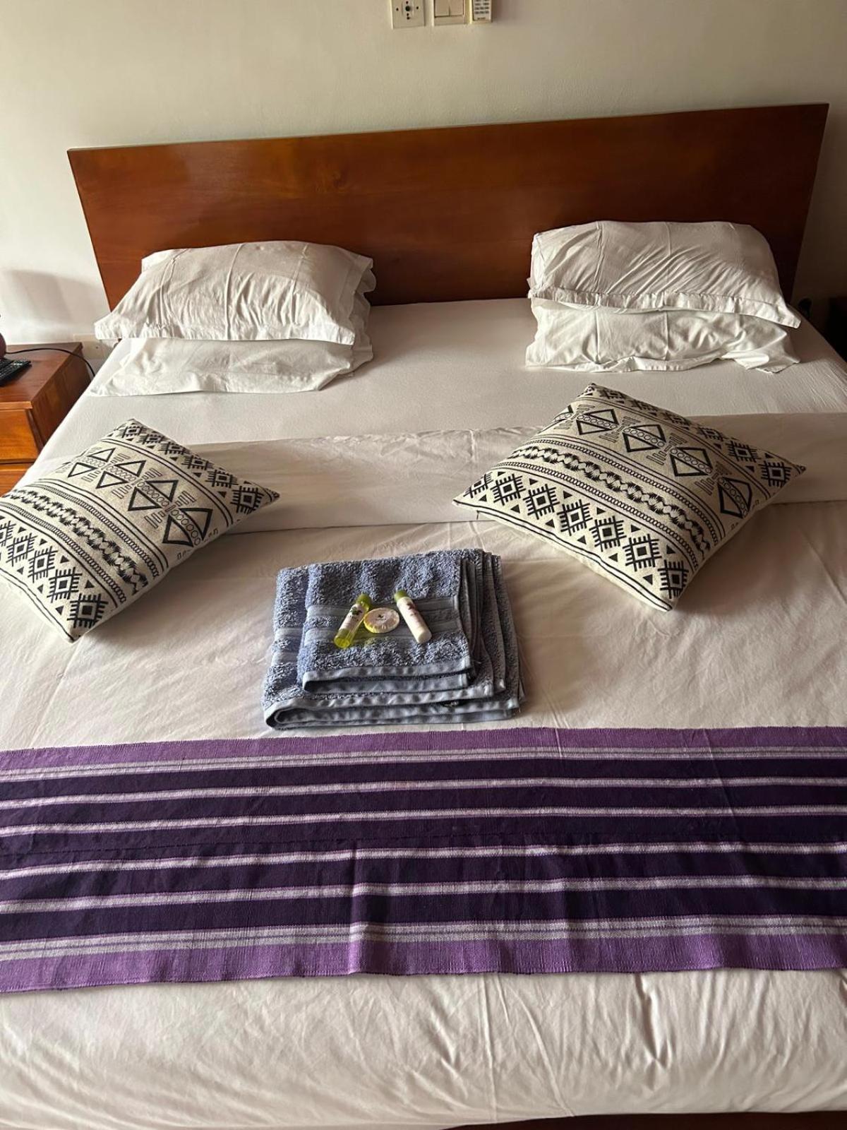 L'Oasis Guesthouse Cotonou Exteriör bild