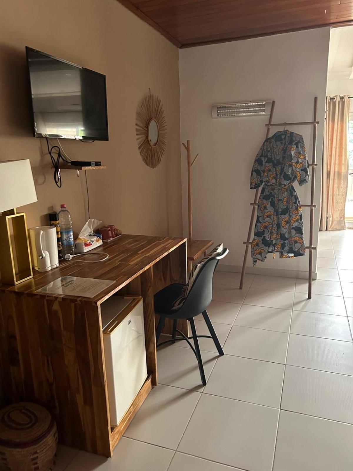 L'Oasis Guesthouse Cotonou Exteriör bild
